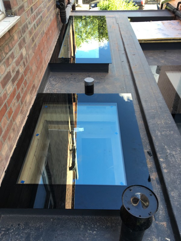 Multiple flat roof skylights on extension in Holloway